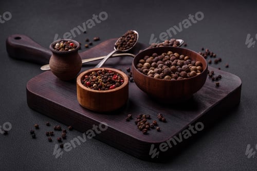 Preview: Spice allspice brown color not ground in a wooden saucer. Asian food