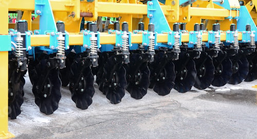 Preview: Spring system of agricultural seeder close up outdoors
