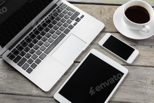 Preview: Open laptop with digital tablet and smartphone close up