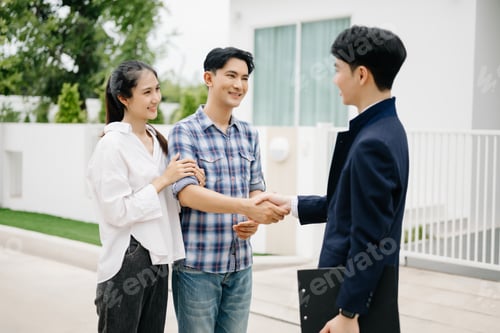Preview: Asian man Real estate broker agent showing a house detail in her file to the couple lover