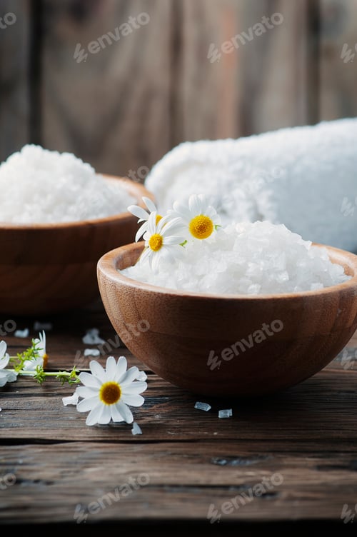 Preview: Concept of spa treatment with salt and daisy