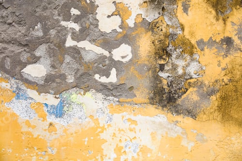 Preview: Old grunge decayed yellow textured wall