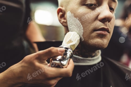Preview: Anonymous barber shaving client