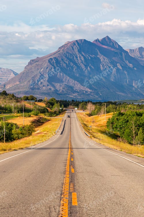 Preview: Scenic Mountain Highway Under Clear Blue Sky
