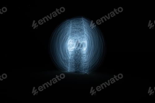 Preview: White bright light trails abstract on black background. Moving lights surreal