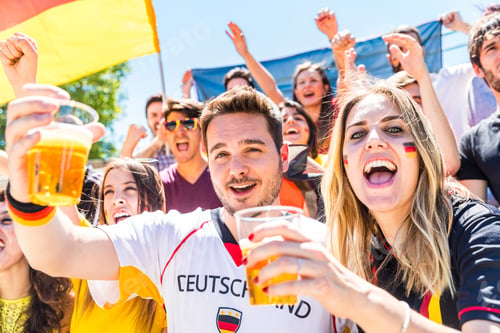 Preview: German supporters celebrating at stadium and drinking beer