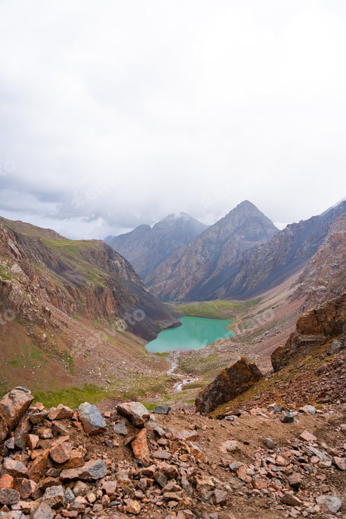 Preview: Turquoise lake in a colorful mountain valley foreground