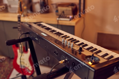Preview: Synthesizer and electric guitar in studio of sound recording
