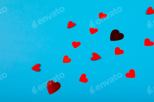 Preview: High angle view of red hearts isolated on blue background, copy space