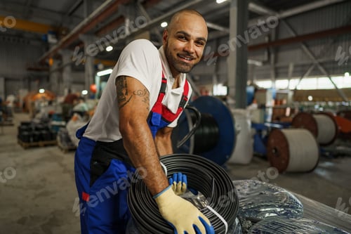 Preview: Portrait of a smiling handsome african american factory worker