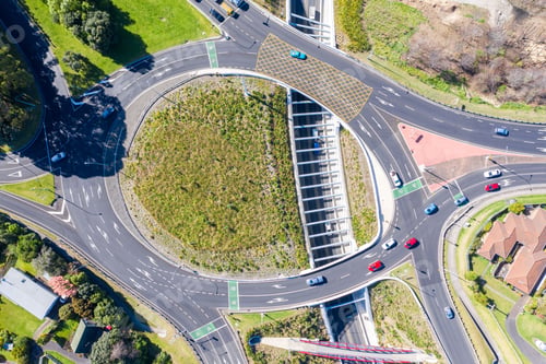 Preview: Aerial cityscape of New Zealand with roundabout road