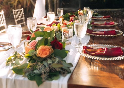 Preview: Romantic tablescape with red roses table setting for wedding event