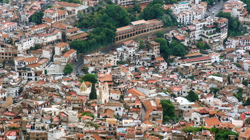 Preview: Vibrant rooftops and historic architecture of Taxco, Mexico from a stunning viewpoint