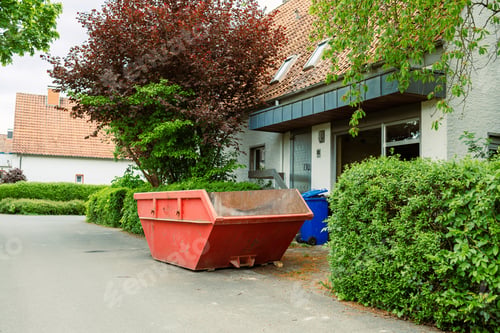 Preview: Large street garbage container. Metal red container for construction waste