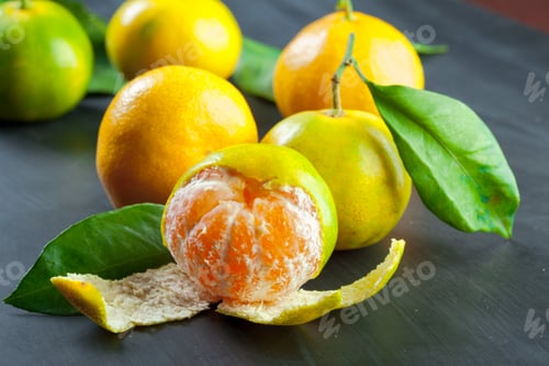 Preview: Mandarins on a black background