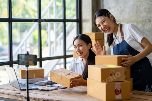 Preview: Startup small business SME. Beautiful asian entrepreneur using camera live streaming online chat wit