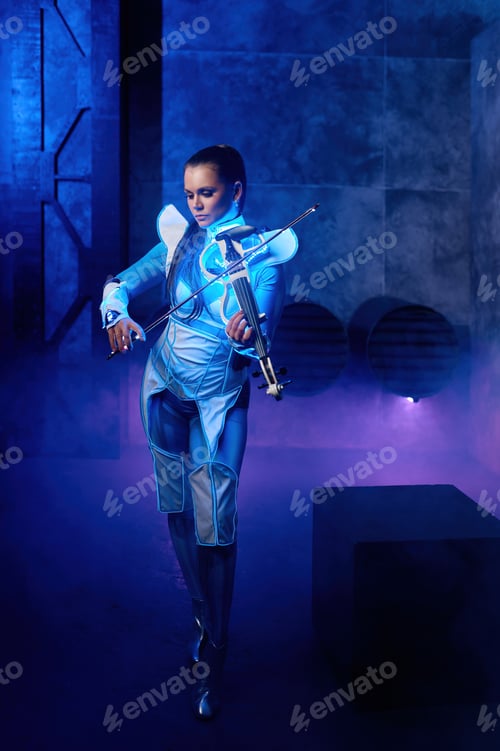 Preview: Young woman playing violin solo on stage illuminated with neon light