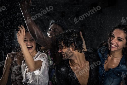 Preview: Group of friends dancing in the rain
