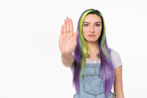 Preview: Young caucasian teenage girl woman hipster showing stop gesture sign with her palm isolated