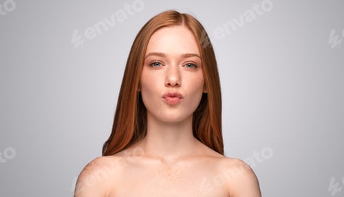 Preview: Ginger female model pouting lips