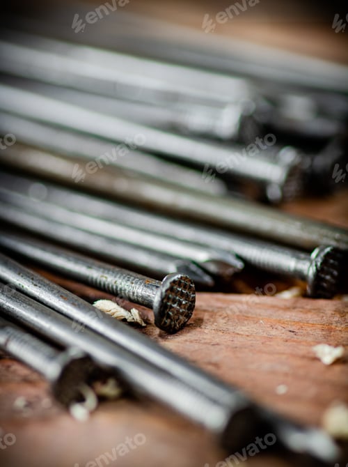 Preview: A bunch of nails on the table.
