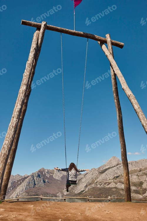 Preview: Huge swing surrounded by mountains in Riano village. Castilla Leon
