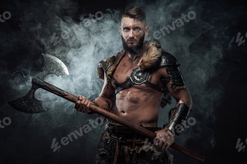 Preview: Violent viking warrior holding his two handed axe in fog