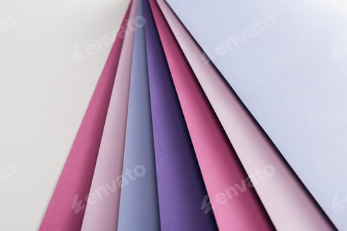 Preview: blue, white, pink and purple sheets of paper on white background