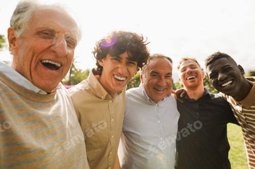 Preview: Multi generational men smiling in front of camera