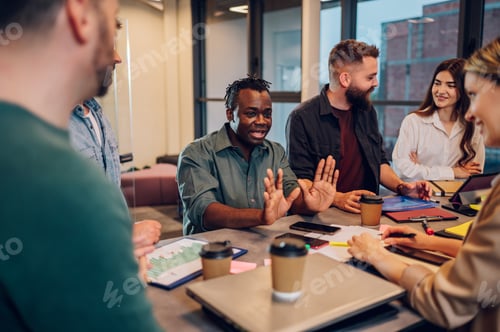 Preview: Multiracial business team working together and having a meeting in the office