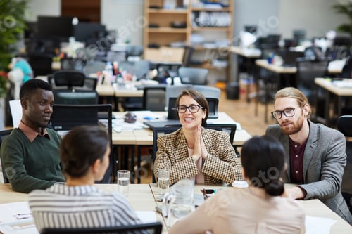 Preview: Smiling Businesswoman in Meeting