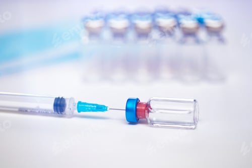 Preview: Close up on vaccine and medical syringe