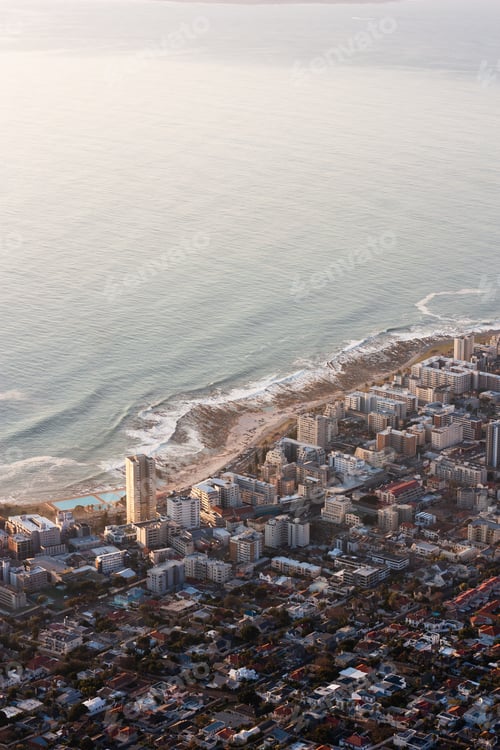 Preview: Aerial shot of a lot of high buildings on the shore near the beautiful sea during daytime