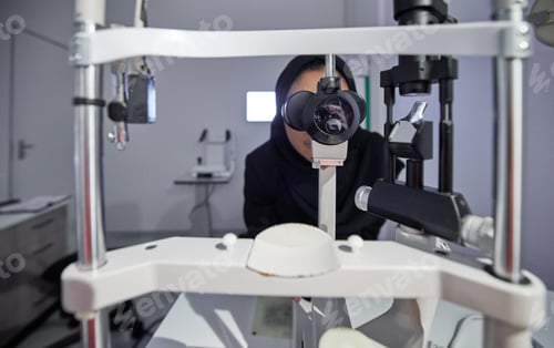 Preview: Optometry, healthcare and optometrist doing eye test in the clinic for eyecare and vision wellness.
