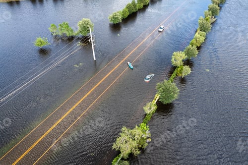 Preview: Flooded road with sunken car in surrounded with water Florida