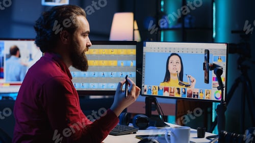 Preview: Photographer filming daily vlog of his work using mobile phone