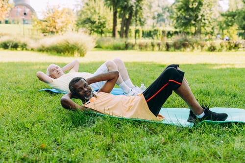 Preview: group of senior friends training at the park
