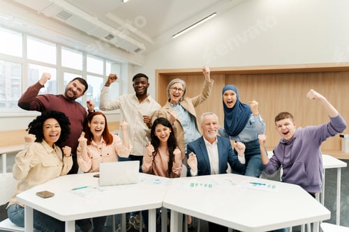Preview: Group of overjoyed business people using laptop celebration success, win money, working office
