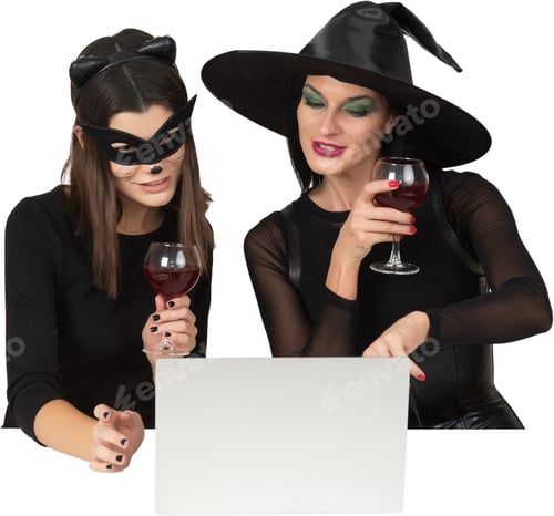 Preview: two women in halloween costumes drinking wine and looking at a blank board