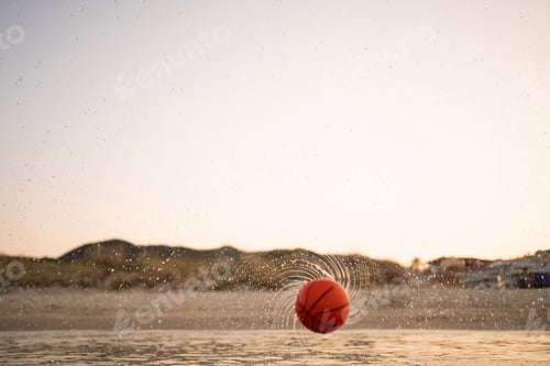 Preview: Family enjoys a day of basketball fun at the beach during sunset