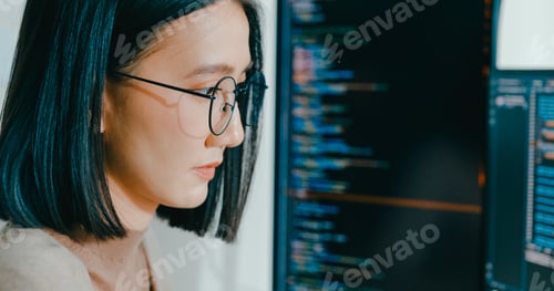 Preview: Closeup young adult Asia female freelance eyeglasses typing write prompt AI bot IT app program.