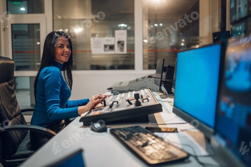 Preview: Middle aged woman using equipment in control room on a tv station