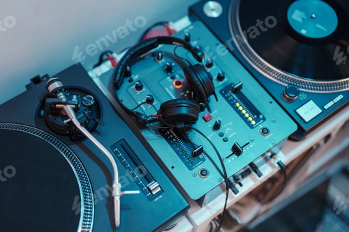 Preview: Professional dj equipment setup with vinyl turntable and headphones