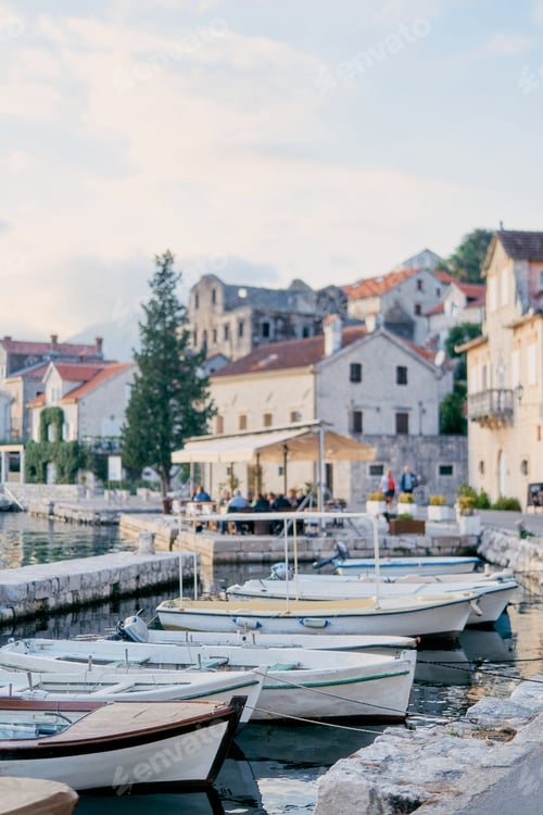 Preview: Fishing boats are moored to the Perast embankment. Montenegro