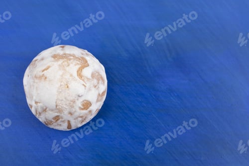 Preview: One whole sweet gingerbread on blue background