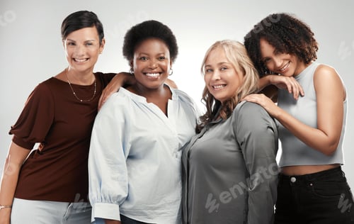 Preview: Shot of a diverse group of women standing close together in the studio and posing