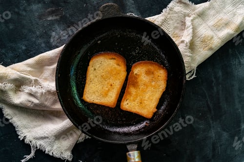 Preview: fresh hot toasted bread slices in the dark table, healthy tasty breakfasts