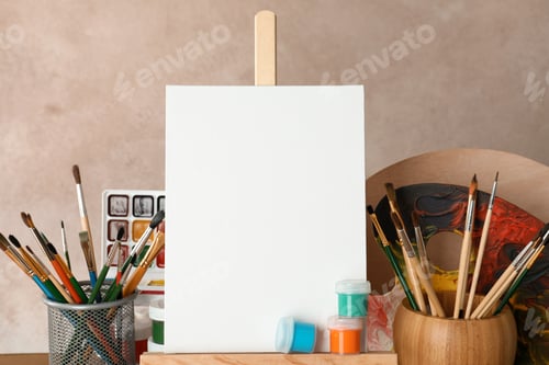 Preview: Blank Canvas Awaits Inspiration with Painting Supplies