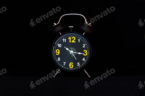 Preview: Alarm clock on black background
