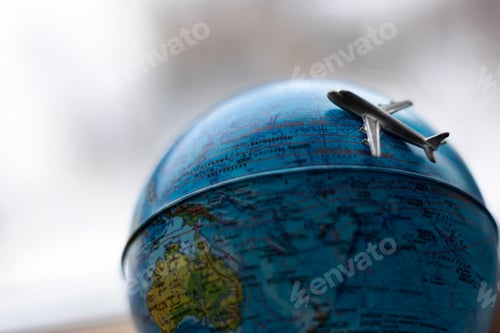 Preview: The globe on which the plane is flying on a journey